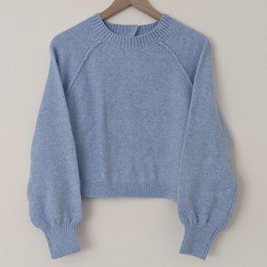 blue sweater w back button detail